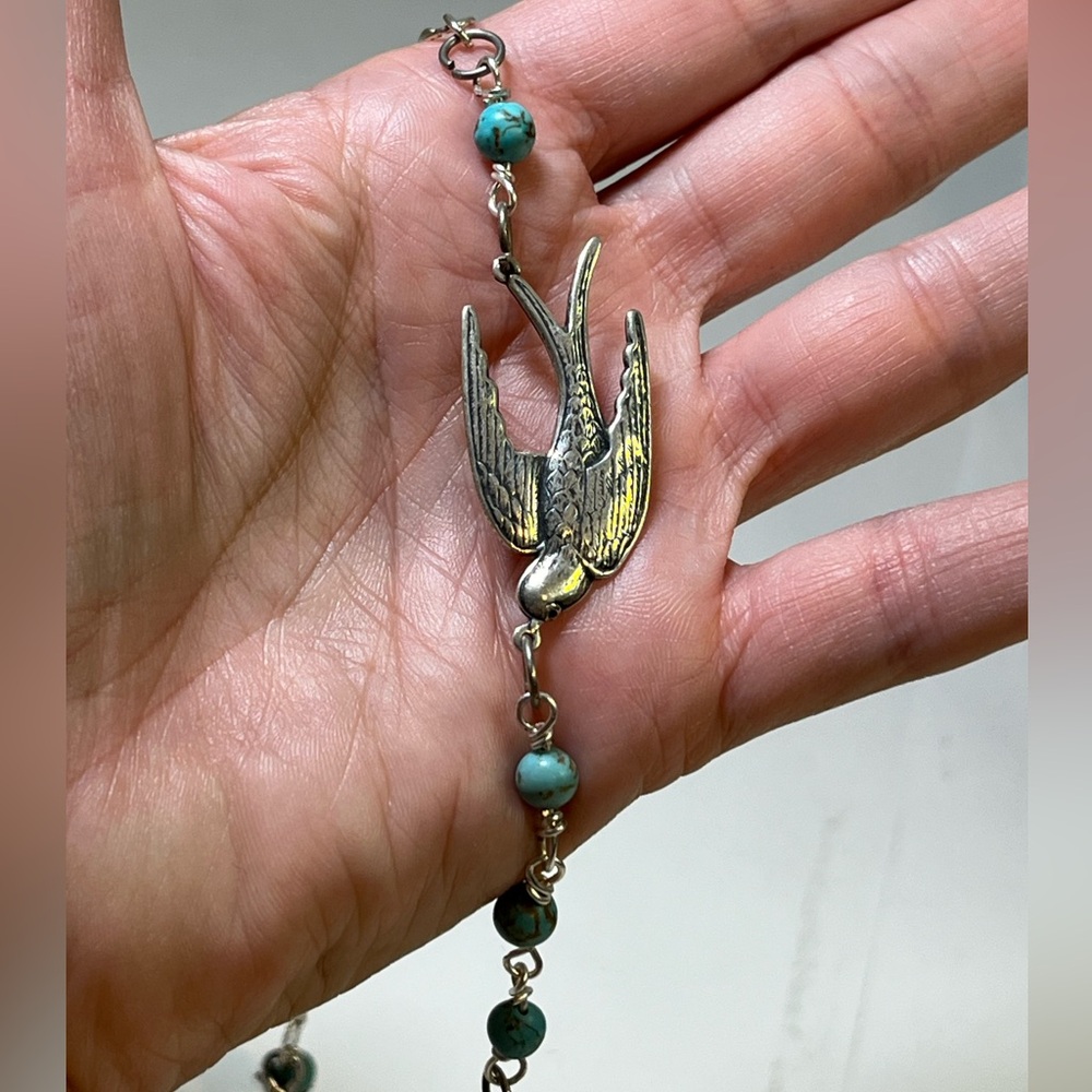 Handmade silver necklace with a bird, purple and turquoise beads - Picture 5 of 8